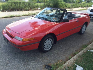 Illustration for article titled For $1,900, This 1991 Mercury Capri Puts The Top Down On Fun